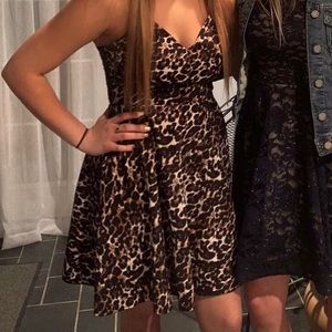 Cheetah print HOCO dress with open back and lace